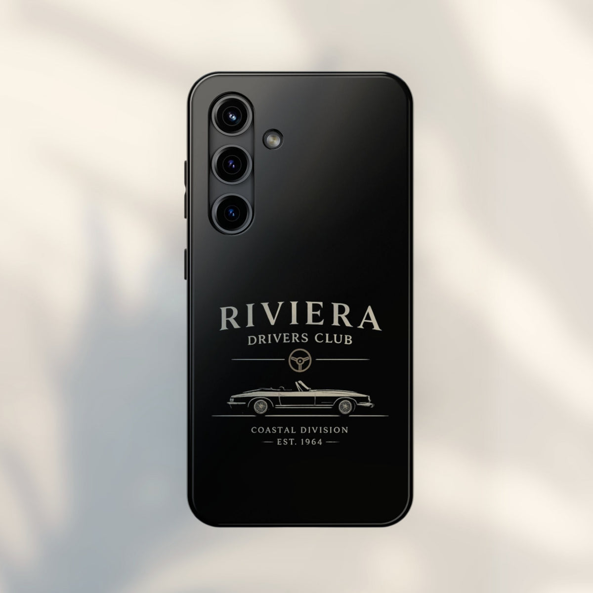 JJ Luxury House Riviera Drivers telefoonhoesje in glanzend zwart met een klassieke cabriolet print