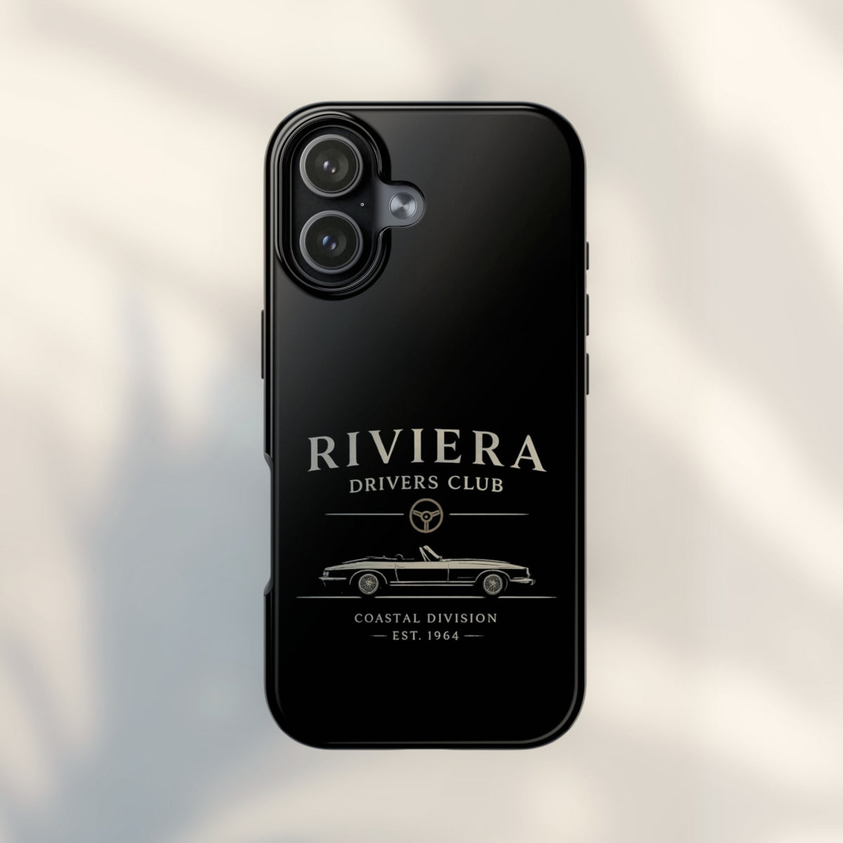 JJ Luxury House Riviera Drivers telefoonhoesje in glanzend zwart met een vintage sportwagen en logo opdruk.